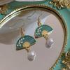 2024 Chinese Ancient Style Fan Earrings: High-End Niche Studs for Women with Ma Mian Skirt Temperament