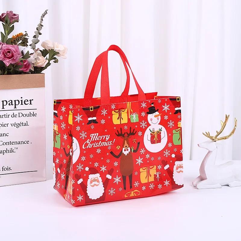 2025 New in Christmas Gift Bags Cartoon Cute Santa Elk Snowman Printing Non Woven Handbag Hot Pressing Wholesale Party Supplies