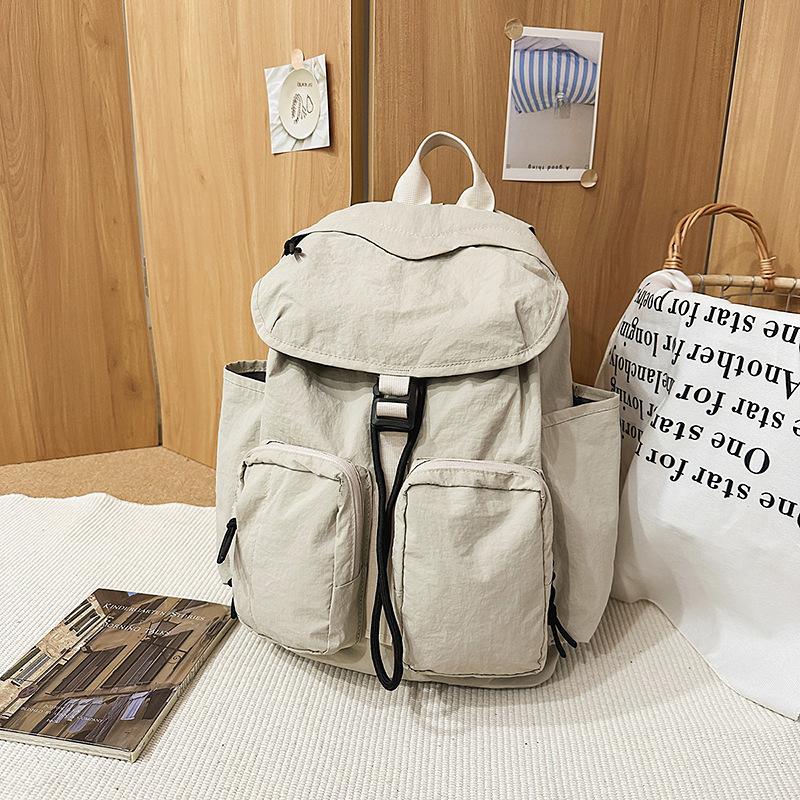 New high-value fresh and sweet backpack couple solid color simple mountaineering travel lightweight backpack