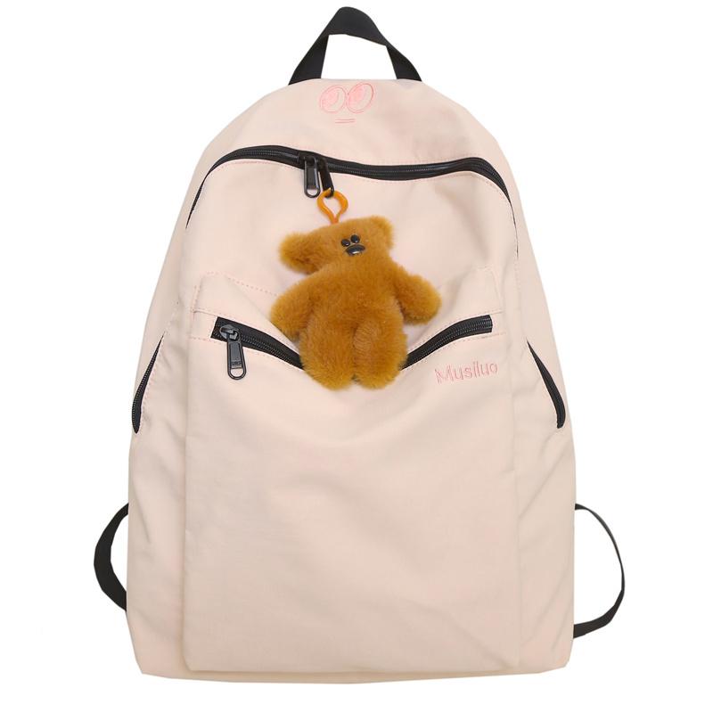 

Однотонний жіночий рюкзак. Чоловічий туристичний рюкзак великої ємності. Студентський шкільний портфель рожевий