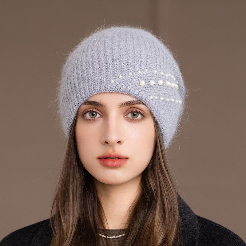 Herbst und Winter Neue Mode Warmer Ohrenschutz Strickmütze Damen Kaninchenfell Wollmütze