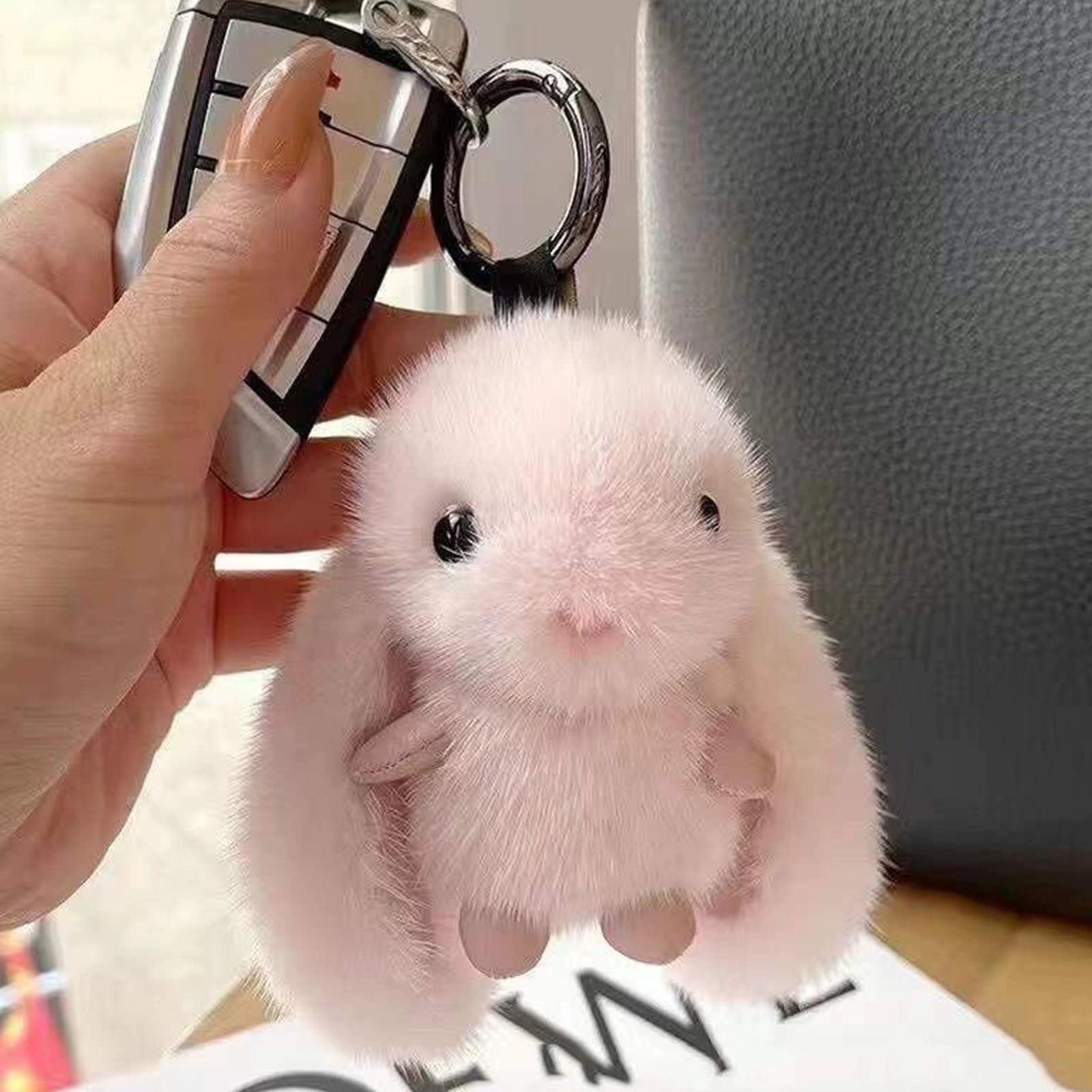 

Интересный брелок из нержавеющей стали с забавным персонажем на среднем пальце One Size розовый