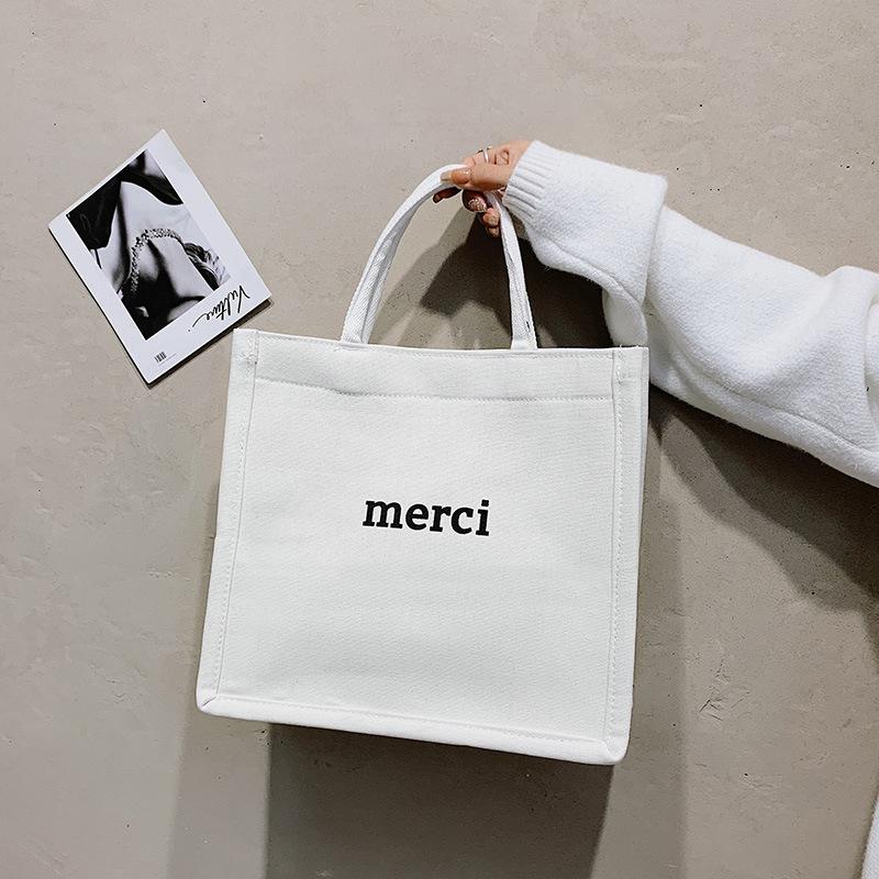 

Large capacity canvas bag, new women s bag, fashionable and simple handbag. белый