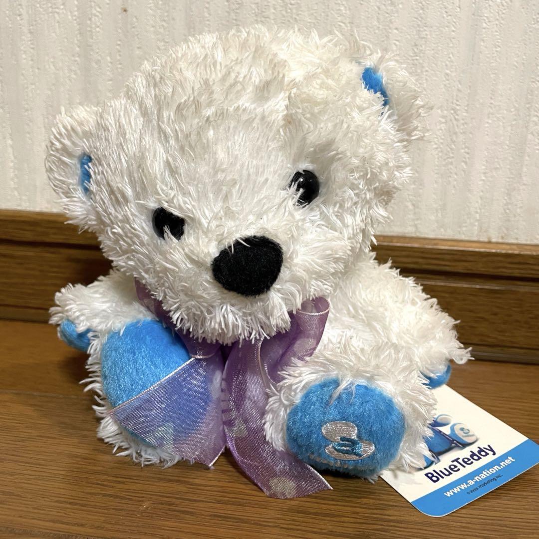 

[USED] a-nation Blue Teddy Bear, Stuffed Animal, White