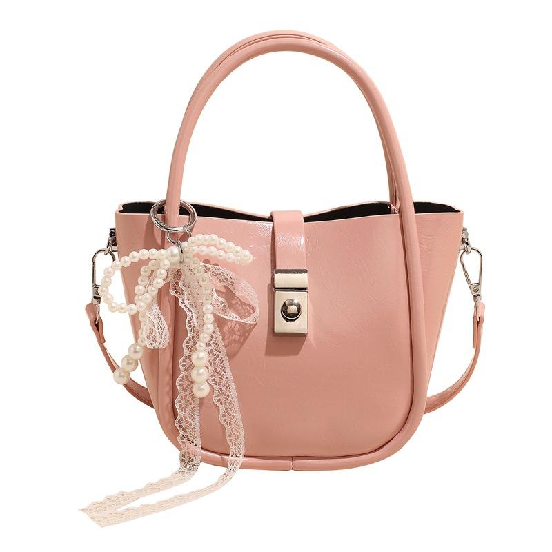 Spring and Summer New Casual Simple High-end Oil Wax Leather Portable Bucket Bag Korean Version Niche Design Solid Color Messenger Bag