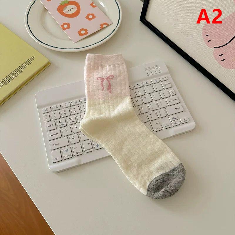

Sweet Bowknot Tied Middle Tube Socks Women Heel Bow Socks Casual Black White Pile Socks Girls Sports Cotton Socks