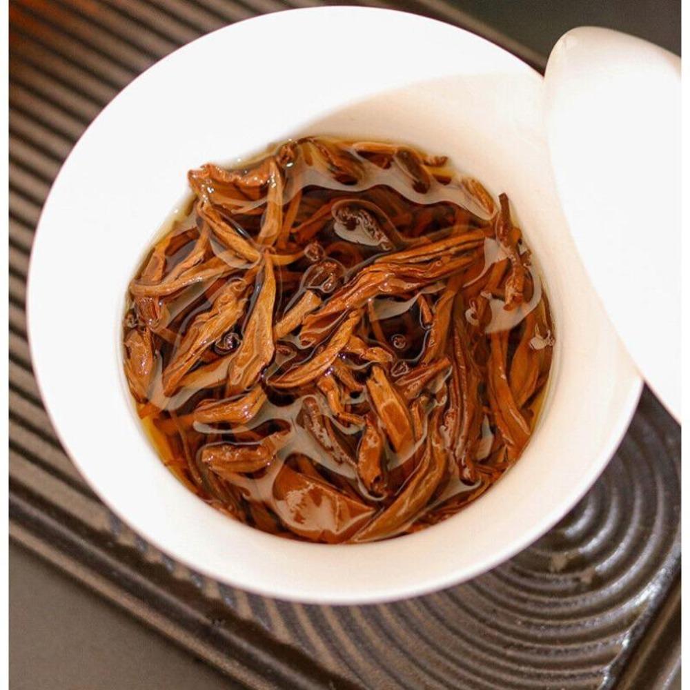 China Yunnan Fengqing árbol antiguo Dianhong Dian Hong té negro ladrillo rojo 250g