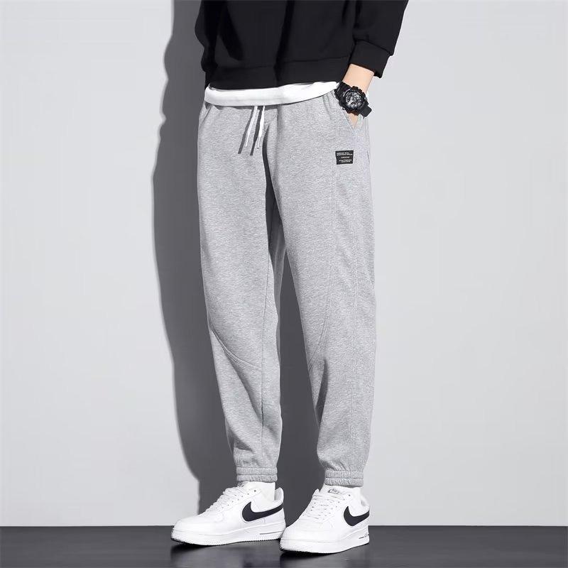 Casual sweatpants summer new loose large size tied feet splicing personalized trendy pants men