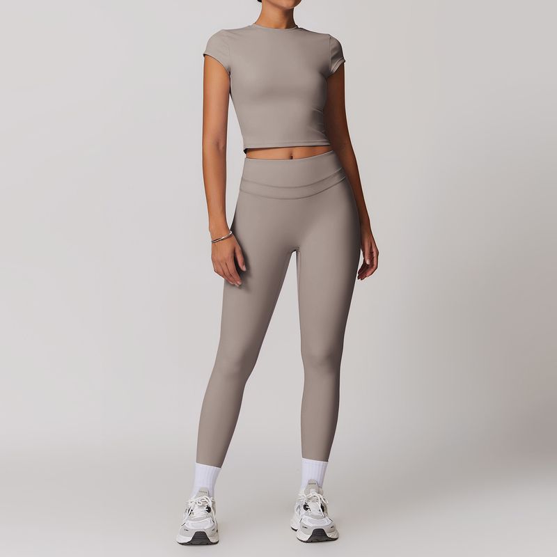 Guangzhou Zechuang Clothing Co., Ltd. Brushed Tight Back Yoga Suit Stretch High Waist Workout Clothes for Women Running