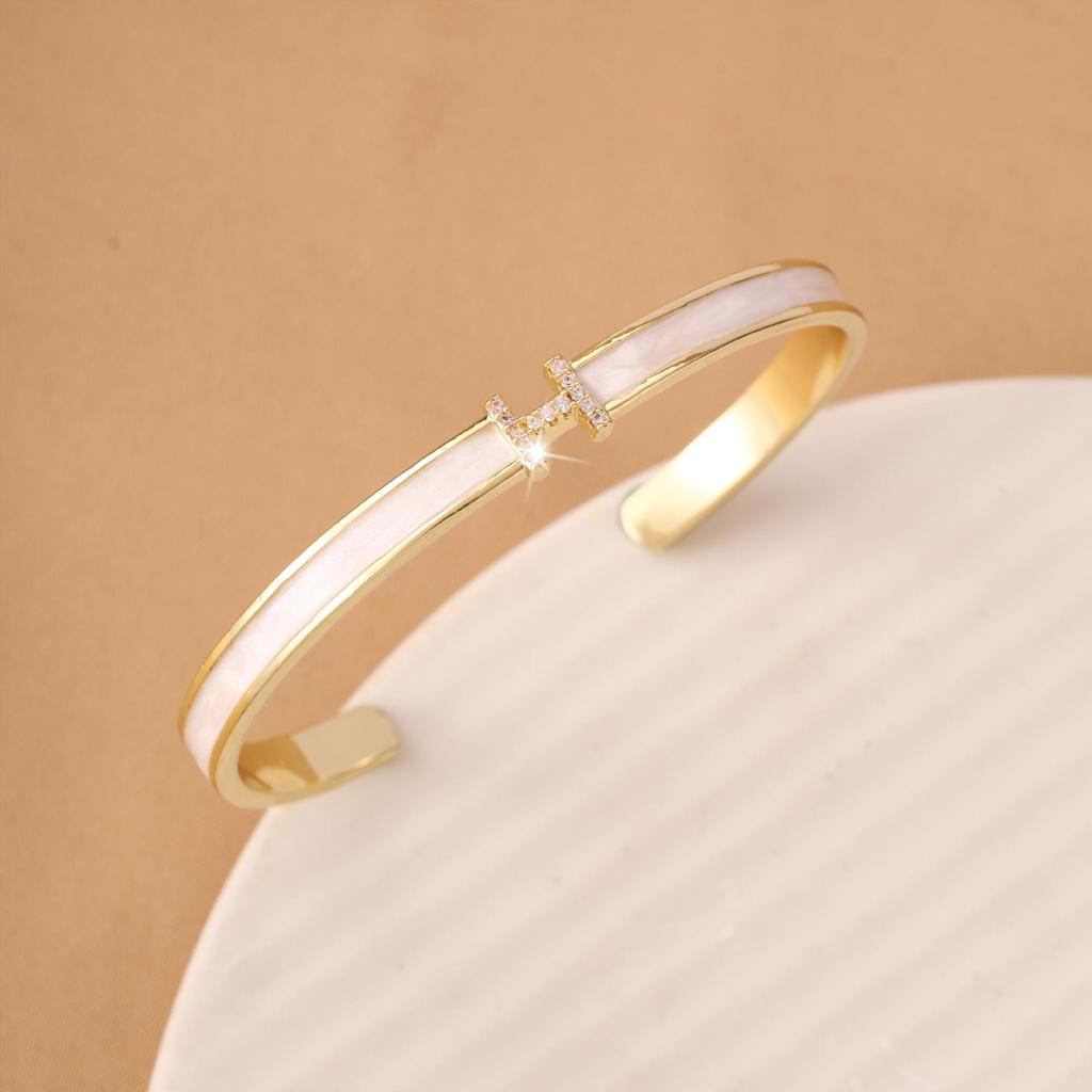 Zirkon Brieföffner Armreif: Luxus Pendelarmband, Exquisiter Modeschmuck für Frauen, Ausgabe 2025.