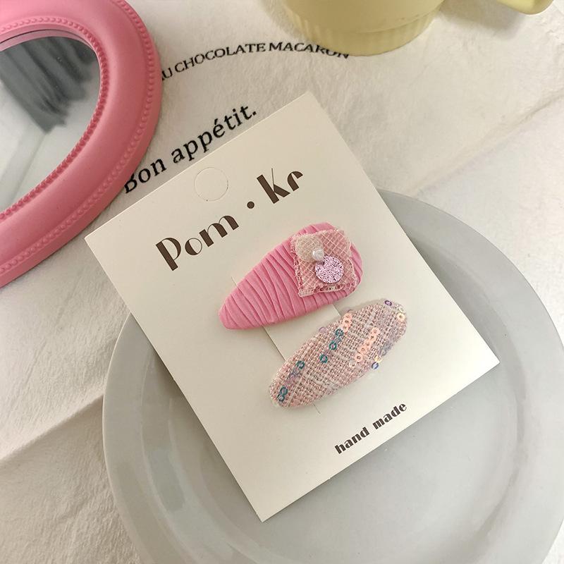 Koreańska spinka do włosów z kokardką w kolorze różowym, idealna do dziecięcych grzywek i kręconych włosów