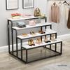 Creative Children's Clothing Display Rack with Faux Marble Waterfall Table