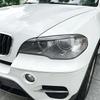 Autocollant de garniture de couvercle de paupière sourcil de phare avant de voiture pour BMW X5 E70 30d 48i 30i 35d 40d 30d 50i 35i M50d 2006-2013