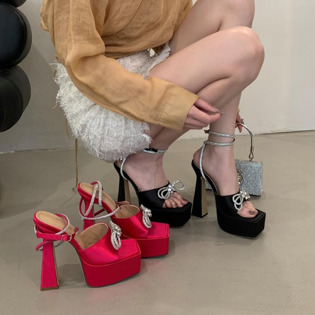 Royal sister wind thick heel runway model catwalk shoes women's super high heel waterproof table bow rhinestone sandals 15cm