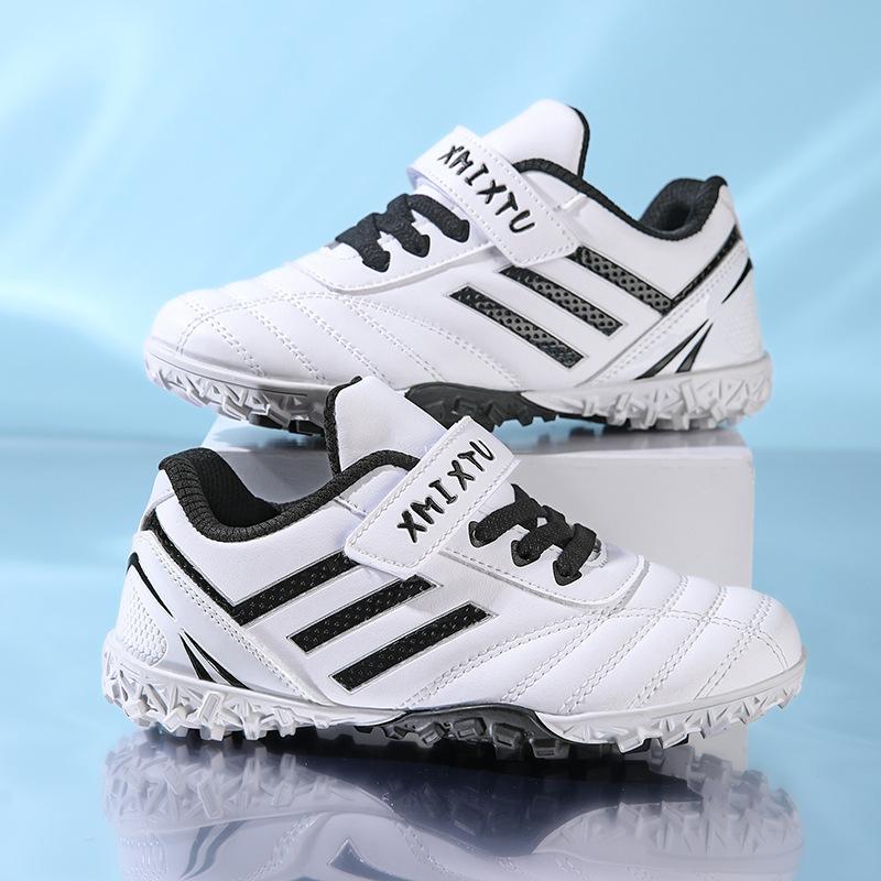 Foreign trade children's football shoes training shoes boys and girls primary and secondary school students kindergarten special broken nail TF spike
