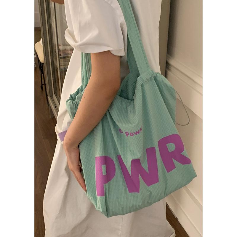 

Casual nylon bag Lazy wind tote bag Women s 2025 letter shoulder bag Large capacity canvas bag