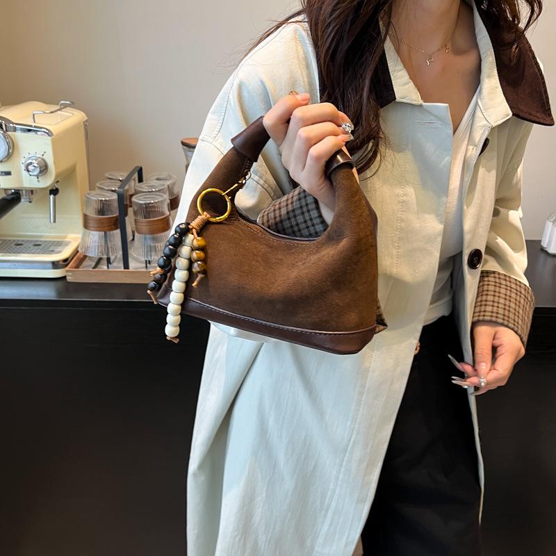 Premium sense niche bag women's autumn and winter 2025 new matte retro messenger bag casual explosion portable dumpling bag