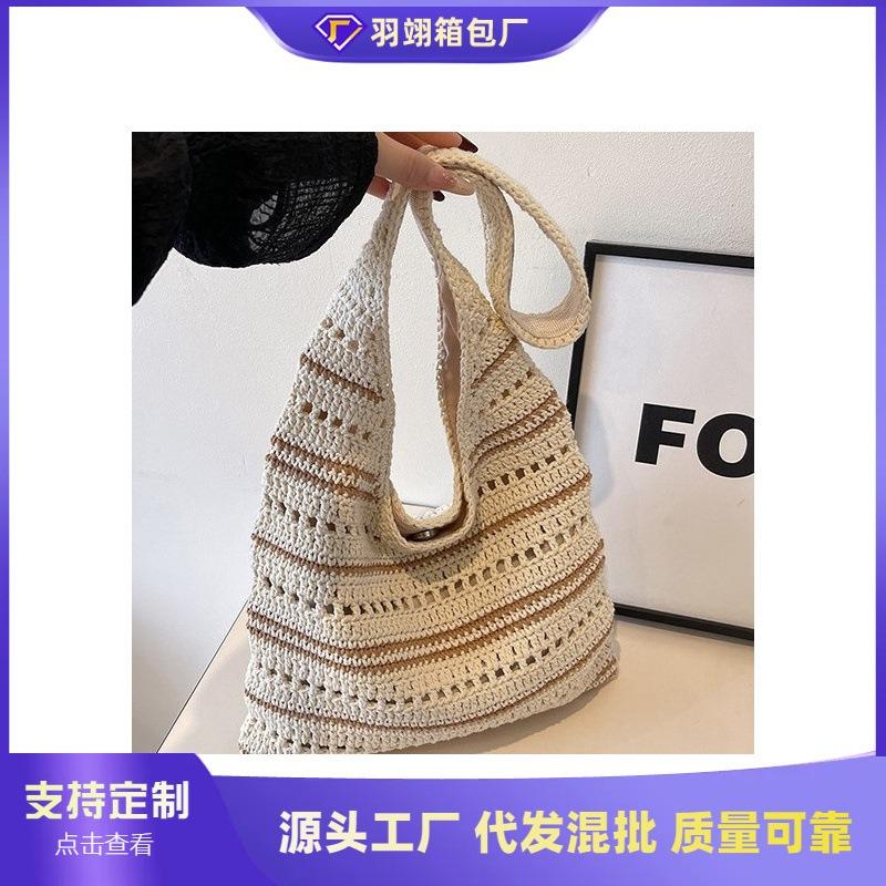 Large-capacity commuter woven bag women's summer new hollow knitted bag slack shoulder beach bag