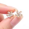 Hot Sale Hollow Five-petaled Flower Zircon Earrings Women's Niche Design High Fashion Cold Wind Earrings Women