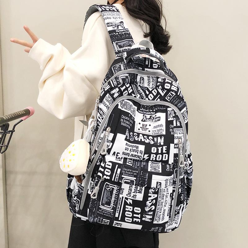High-value Graffiti Schoolbag Male Korean Version Student Junior High School High School Student Backpack Male Campus Large-capacity Backpack Female