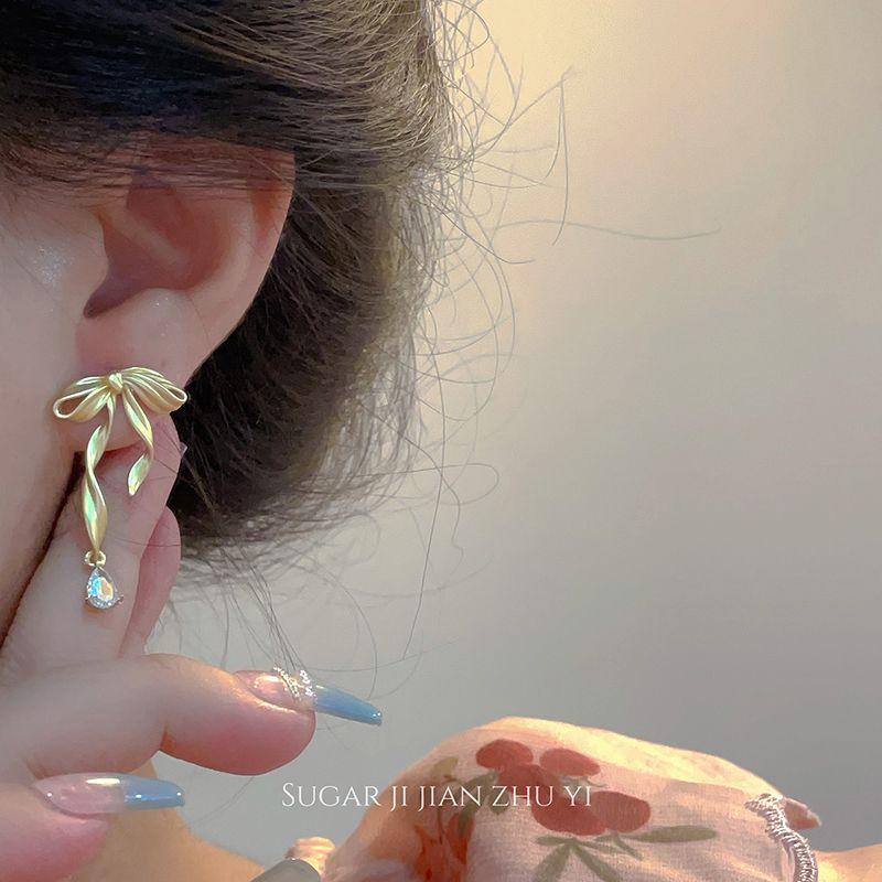 

Сахар Самый продаваемый товар Мода Изящная Личность Женские Банты Gold