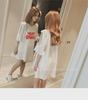 2024 Korean Style Off-Shoulder Bowknot Print Mid-Length T-shirt Dress with Five-Point Sleeves.