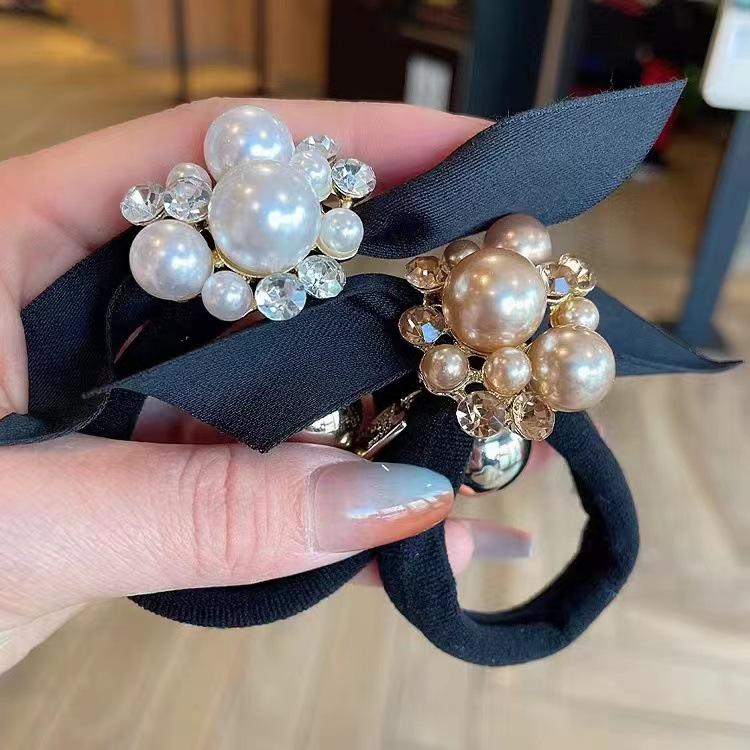 Korean Pearl Bow Hair Tie – Elegant Ponytail Accessory