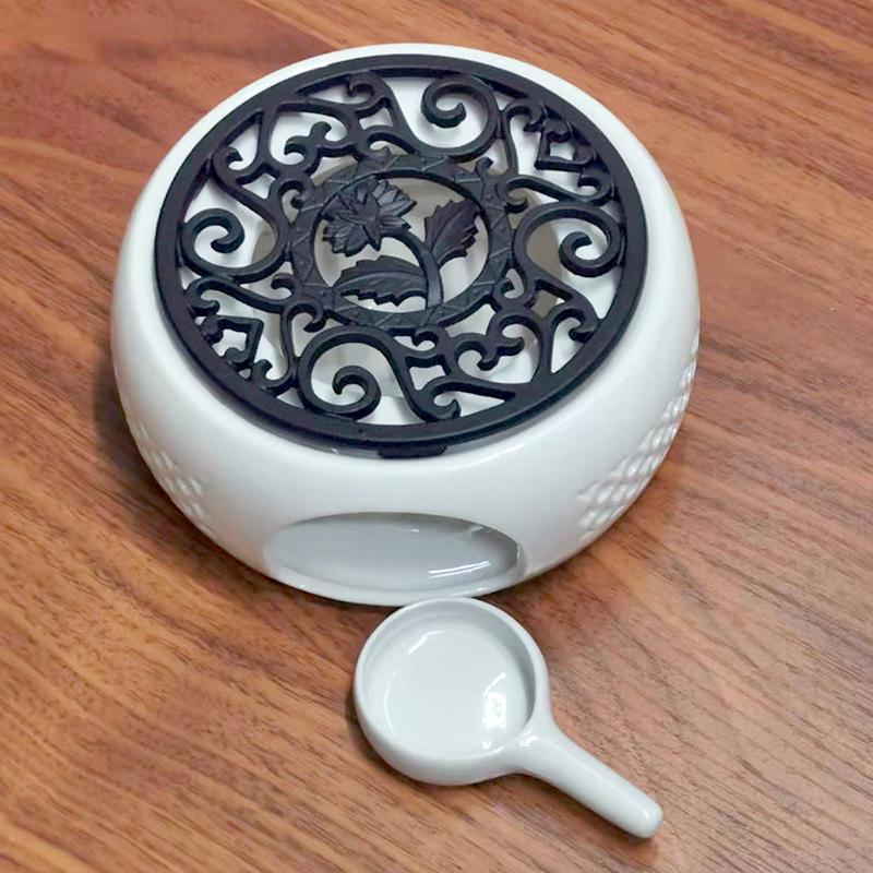 White Porcelain Tea Set with Black Ceramic Stove and Candle Base