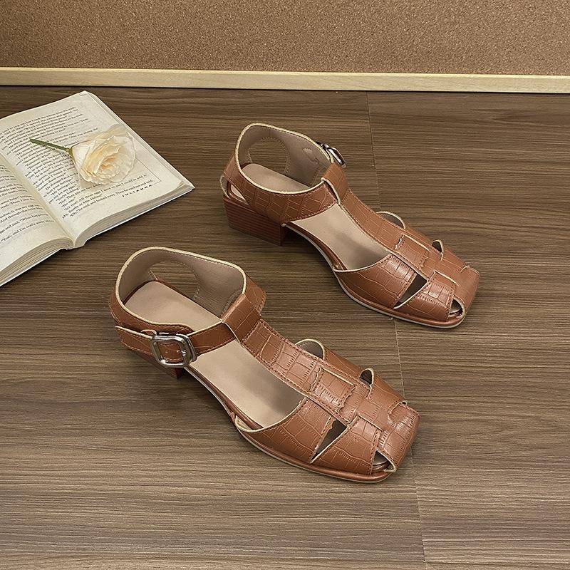 Soft leather retro baotou woven flat Roman sandals summer new square head hollow versatile casual pig cage shoes women