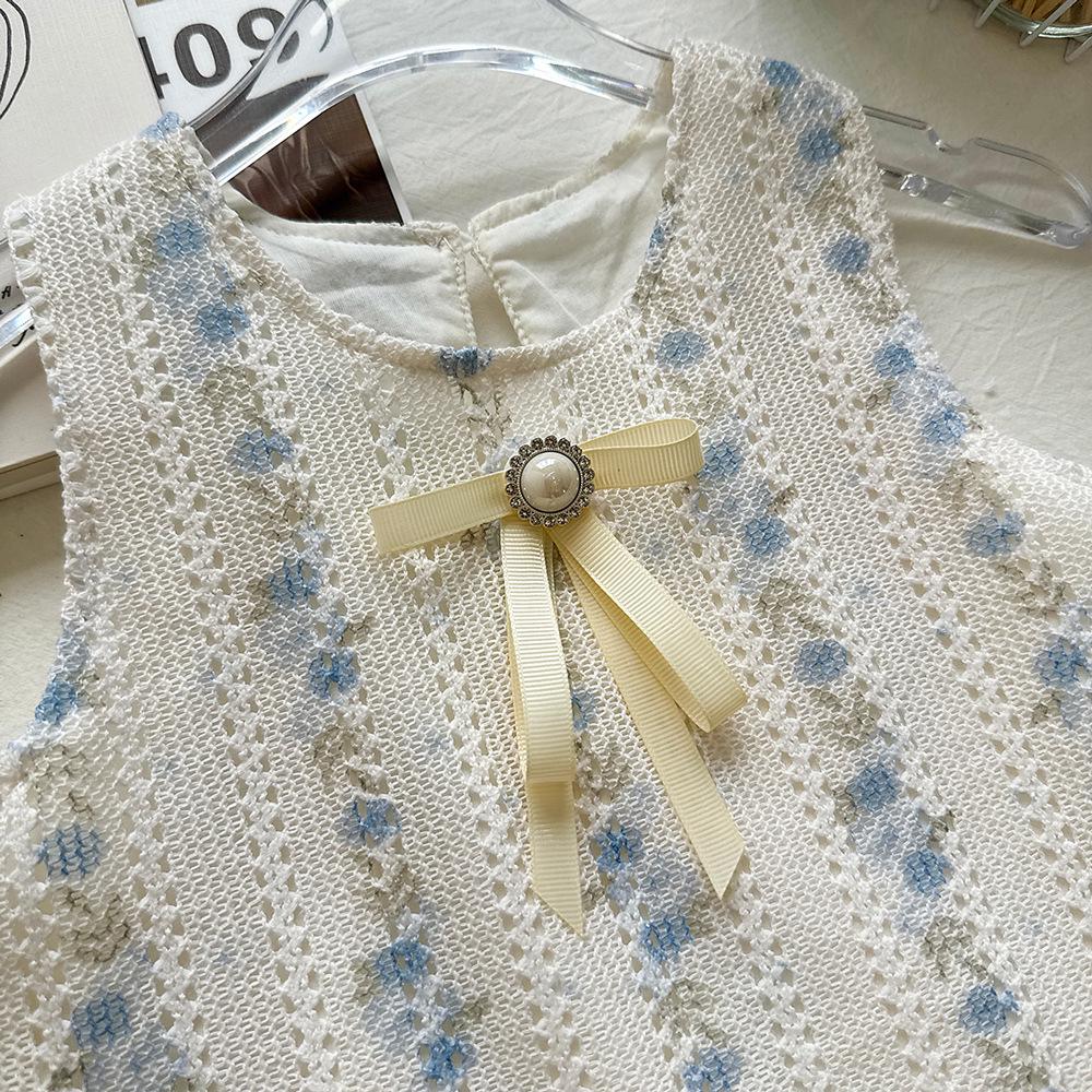 Pigekjole uden ærmer med blomstret net-lappeværk og sløjfe - Sommer 2026 Prinsesse-stil