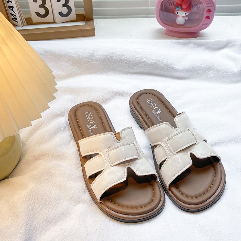 Retro one-word slippers women's summer wear 2025 new flat-bottomed seaside vacation sandals casual sandals