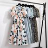 Vintage Floral Dress With Pleated Skirt And Cross Tie For Elegant Summer Workwear