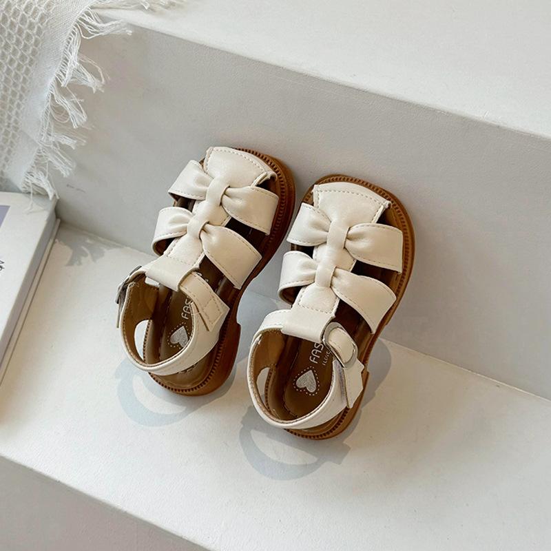 

Летние сандалии Новая простая мода Обувь для девочек Мягкие Противоскользящие Удобные Детские сандалии Плоские Ретро Повседневные Пляжные Детская обувь 2025 Каблуки 23insole15cm бежевый