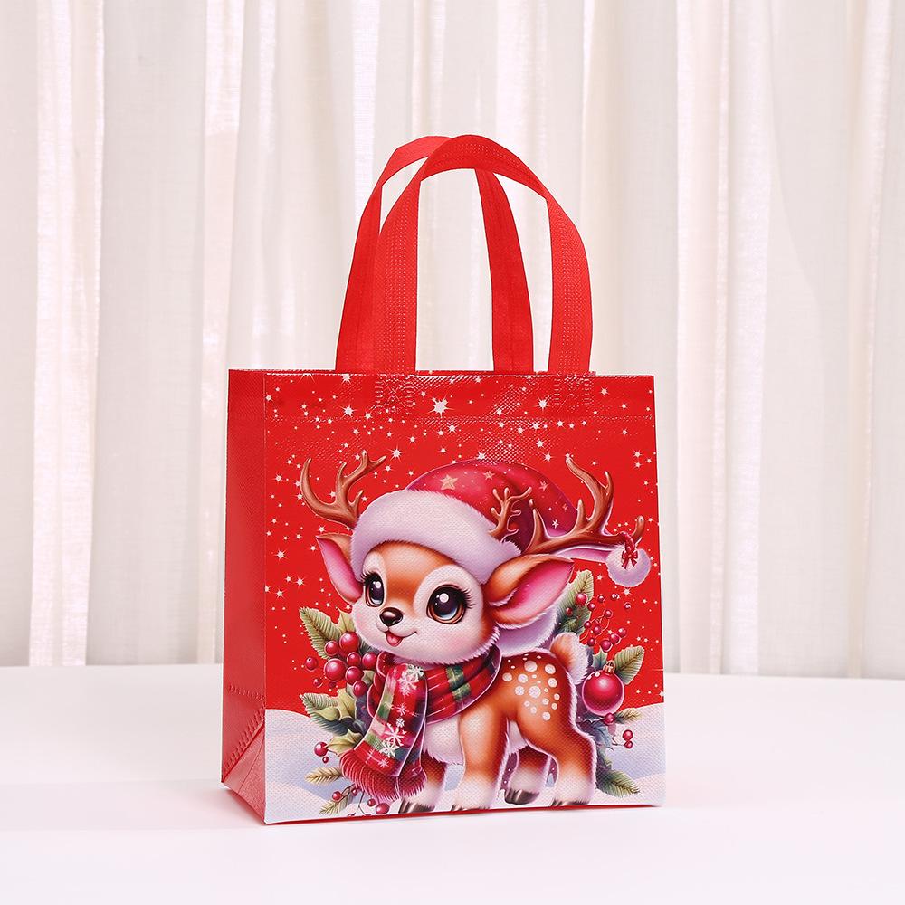 StoBag Christmas Non Woven Bags Red Santa Reindeer Gift Wrapping Bags Reusable Tote Bags for Sweets Holiday Candy Treat