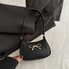 Chic Red Hobo Bag With Gold Bow Accent Adjustable Shoulder Strap Pebbled PU Leather Purse For Casual And Dressy Occasions