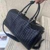 Sac de voyage tissé haut de gamme à main avec grande capacité pour hommes et femmes, Sac à bagages à une épaule, Sac de voyage d'affaires noir