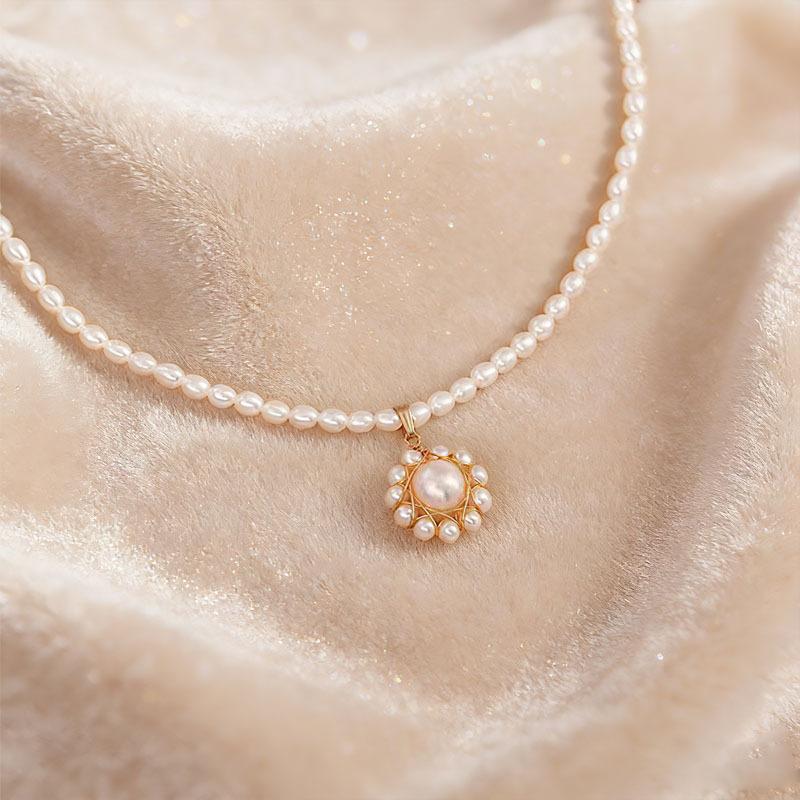 Hand-woven natural freshwater pearl necklace female sunflower high-end light luxury French retro pendant collarbone chain