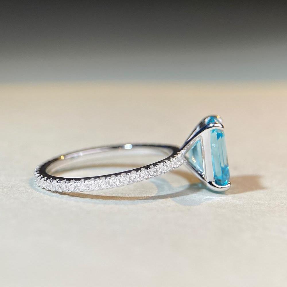 Aquamarine Emerald-Cut Ring In 925 Sterling Silver with Pave Diamonds, Plated In PT950 Gold.