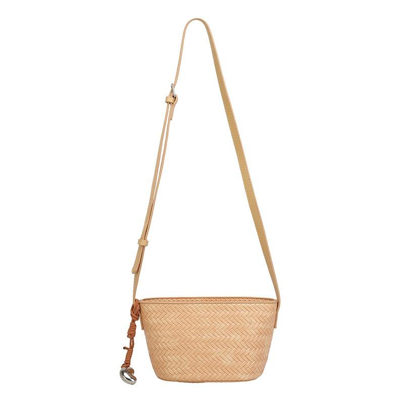 Summer high-end commuting niche mobile phone crossbody small bag women's new woven pattern bucket bag tide