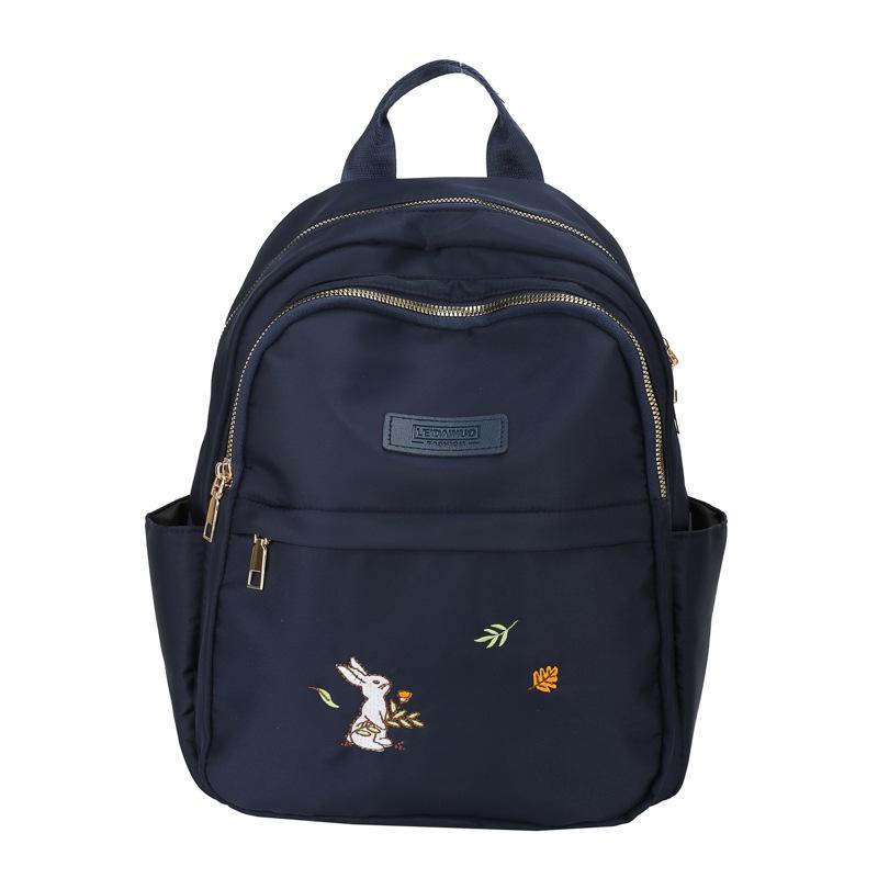

New Trendy Travel Oxford Cloth Small Backpack for Women s Travel Embroidered Canvas Small Bag синій