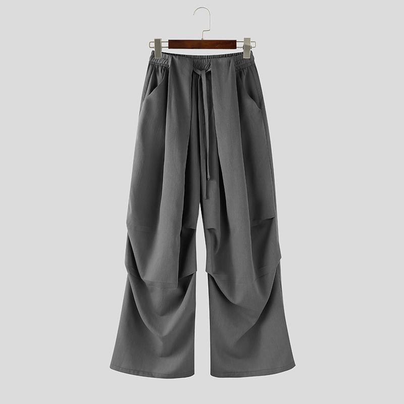 INCERUN Heren Achter Elastische Taille Geplooide Casual Lange Wijde Pijpen Broek met Zakken