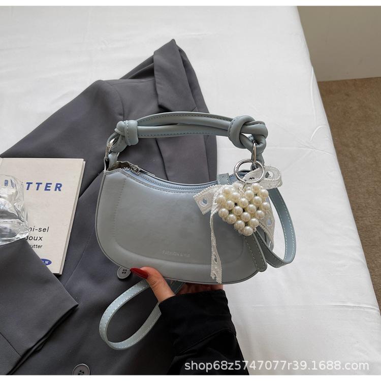 

This year, the popular bag ladies 2025 new trendy retro texture hand bag spring and summer high-end shoulder messenger bag синій