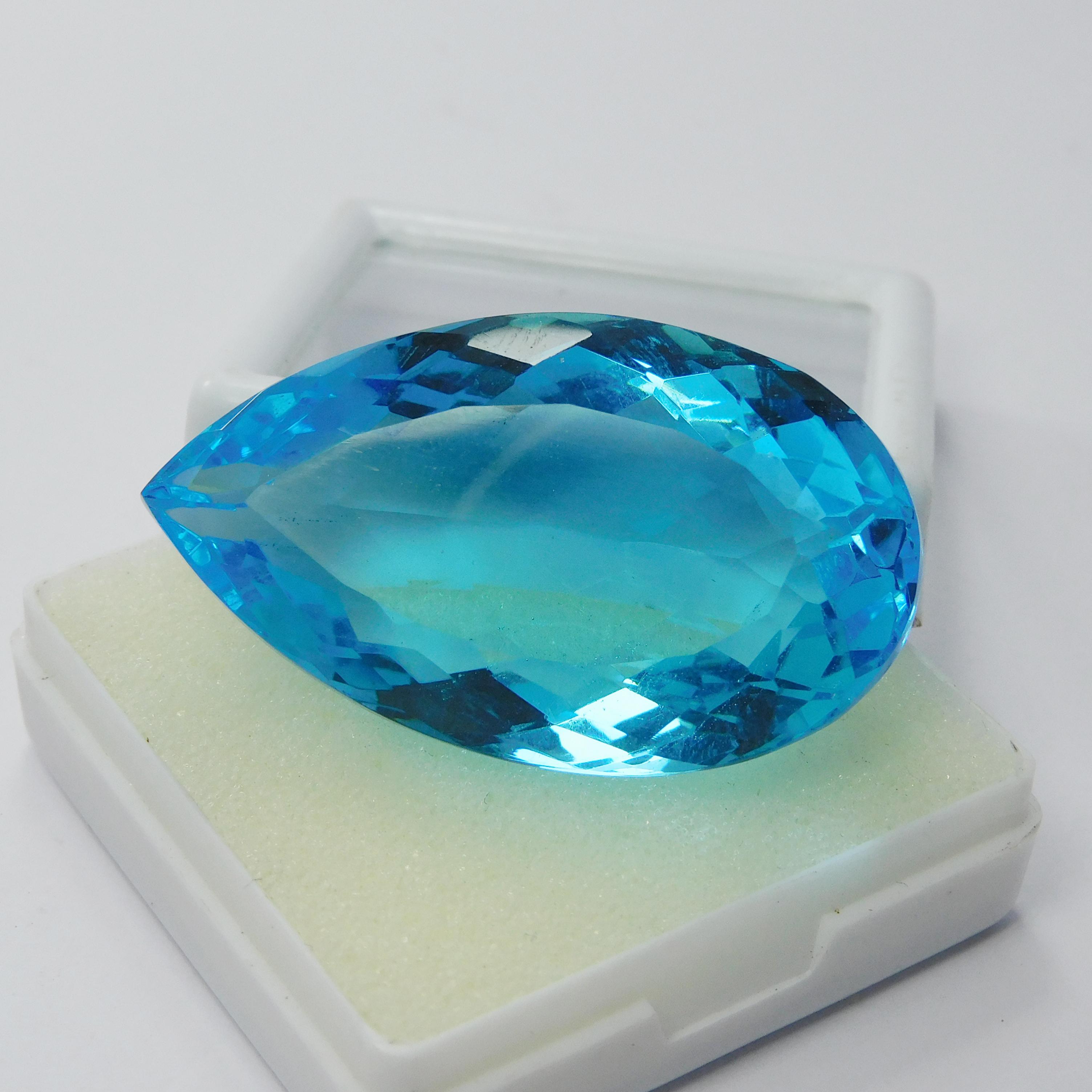

Blue Sapphire 87.00 Ct Loose Gemstone CERTIFIED Lab-Created Pear Cut Perfect M-1006-Ra 40.5 mm approx синій