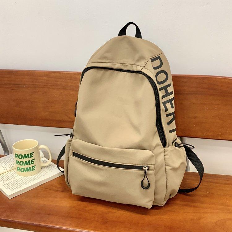 Schoolbag Korean version girl light solid color simple small schoolbag women large capacity junior high school high school students computer backpack