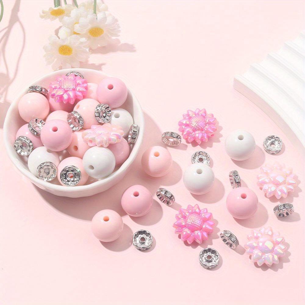 56pcs acrylic decorative beads, including 30 15.5mm round acrylic beads, 6 acrylic flower shaped beads, and 20 10mm shiny spacer beads