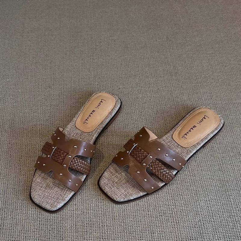 Sheepskin version~ New niche leather rivet one-word slippers women's versatile outer wear comfortable flat-bottomed cool slippers