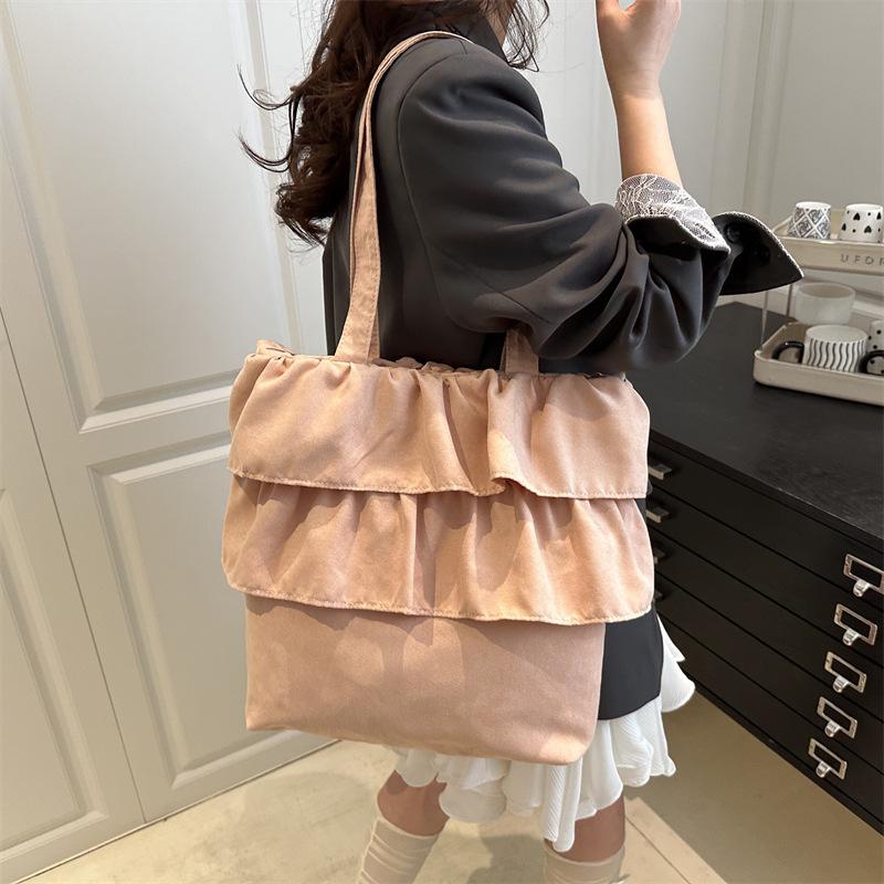 Skirt pleated personalized tote bag women's 2025 summer new niche bud bag single shoulder messenger bag wholesale