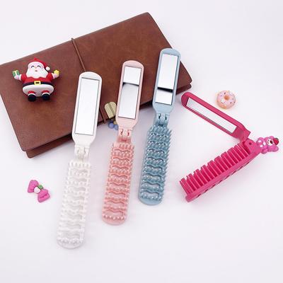 Hohlkamm, faltbarer kleiner Haarkamm, 2-in-1-Haarbürste mit Spiegel, tragbarer Massagekamm, antistatischer Kamm, Reise-Styling-Zubehör