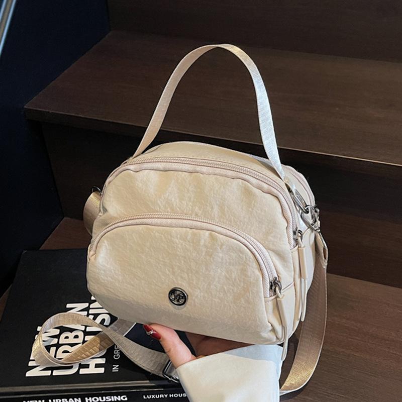 

2025 Новая модная нейлоновая сумка женская большая вместимость многофункциональный рюкзак через плечо женская повседневная сумка-мессенджер хаки