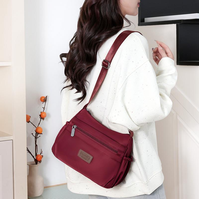 New simple and versatile messenger bag large capacity lightweight mother bag solid color